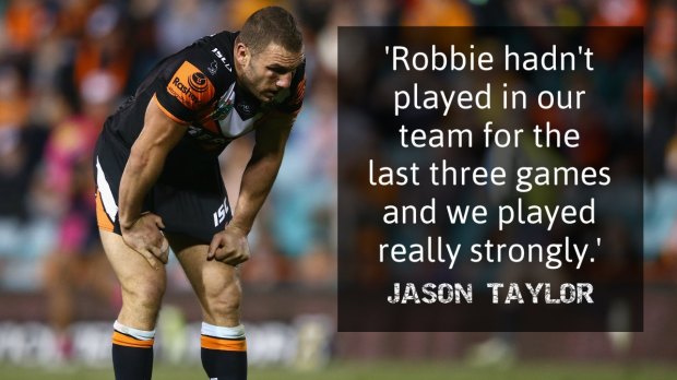 Tension: Robbie Farah and his Wests Tigers coach hardly seem to be great mates.
