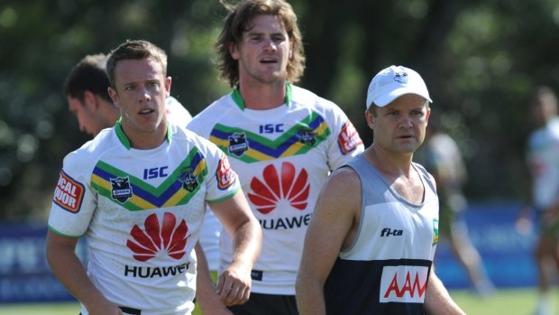 Still in the game: Chris James referees an opposed session at Raiders training.