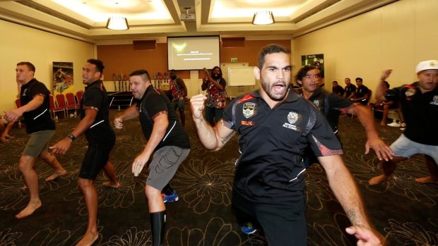In step: Greg Inglis leads the Indigenous All Stars in a rehearsal of the warrior dance that will take place before the game.