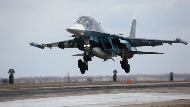 A Russian Su-34 bomber lands after returning from Syria at an airbase near the Russian city of Voronezh on Tuesday.