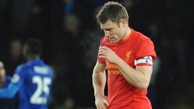 Liverpool captain James Milner walks from the field after the loss to Leicester.