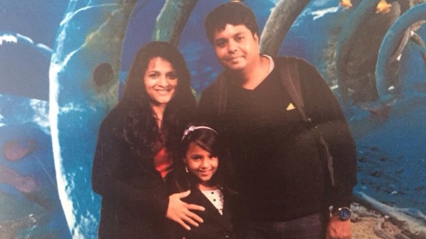 Prabha Arun Kumar with her husband Arun and daughter Meghana.