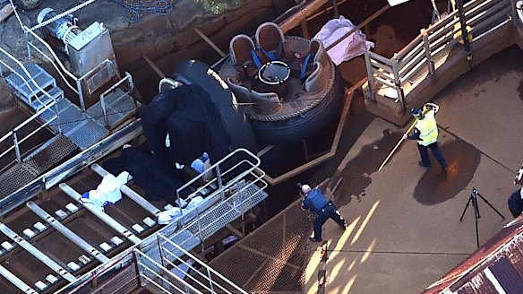 The scene at the Thunder Rapids ride after the accident.