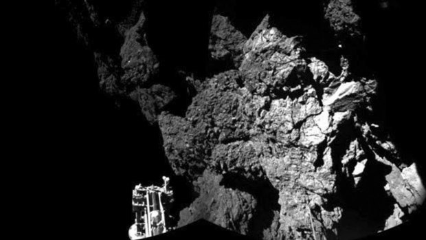 First contact: The first image of the comet's surface taken by Rosetta's lander Philae. One of the lander's three feet can be seen in the foreground.