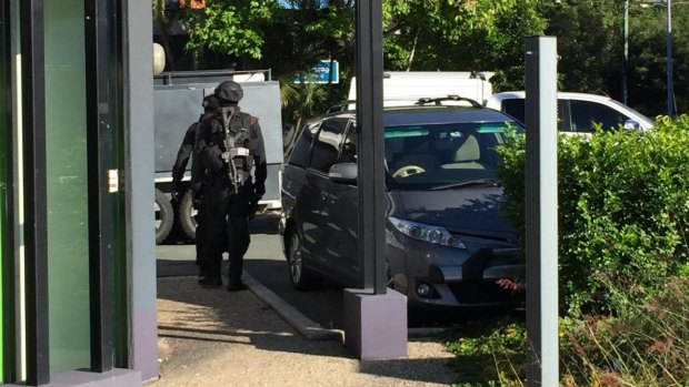 Police armed with riot shields and assault rifles were called to the scene after it was discovered the man was armed.