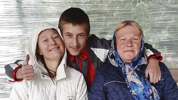 Vladyslav Bondarenko (centre) with his aunt Natalia Kulakivska (left). Vladyslav was captured by Russian soldiers in Bucha and taken to Hostomel, where he was beaten and interrogated. It is believed that while being transported Vladyslav tried to escape and was killed by Russian soldiers.