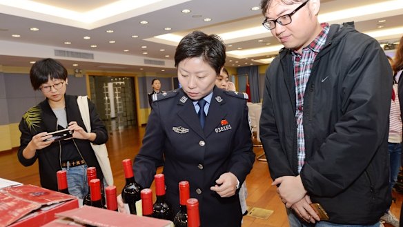 Bottles of counterfeit wine being sold on China's site, Alibaba, shown at a press conference in Shanghai on November 16, 2017. Pictures supplied by Alibaba