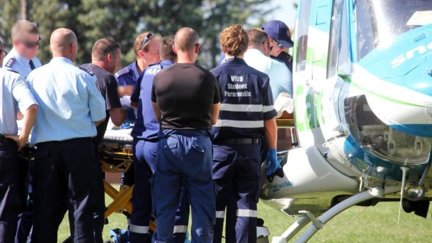 A Goulburn jail inmate was airlifted to hospital in the SnowyHydro SouthCare helicopter after he was stabbed and had hot water thrown on him.