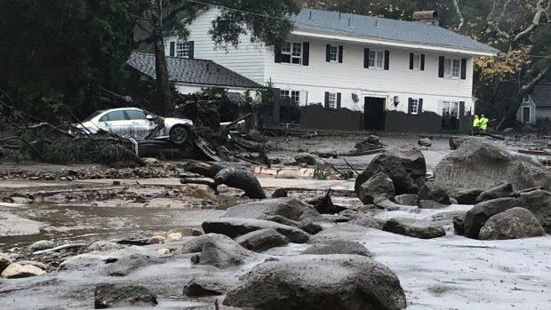 The mudslides swept Southern California homes from their foundations as a powerful storm drenched recent wildfire burn areas.