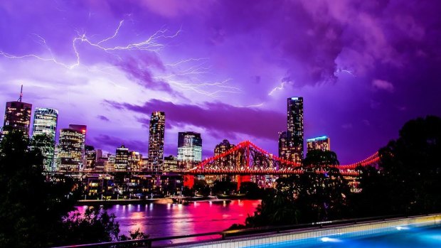 Monday night's storm lights up Brisbane, as seen from New Farm.