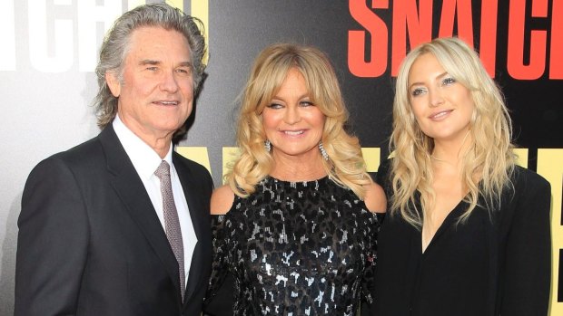 Kate Hudson with her step-father Kurt Russell and mother Goldie Hawn.