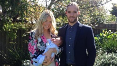 Kate, her partner Aaron, and their son Mason. 