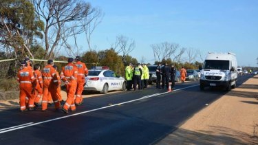 Police and emergency services at the Karoonda Highway near Wynarka in July.