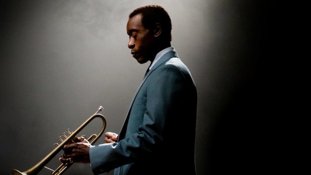 Don Cheadle says learning the trumpet gave him an insight into Miles Davis.