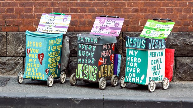 It's art, Lord: Trolleys handpainted by street preacher Desmond Hynes feature in the Jesus Trolley exhibition. 