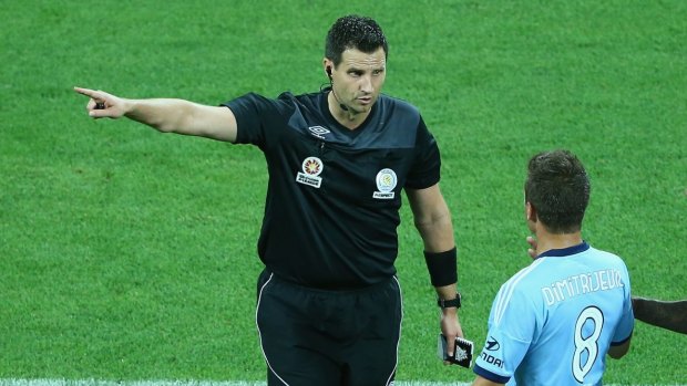 Marching orders: Sydney FC's Milos Dimitrijevic is sent from the field by referee Kris Griffiths-Jones.