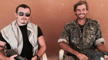 Brisbane man Ashley Dyball, left, pictured here with fellow Australian Reece Harding, right, who was killed fighting IS in Syria.