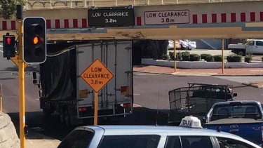 It's Groundhhog Day in Bayswater as another truck gets stuck under the bridge. 