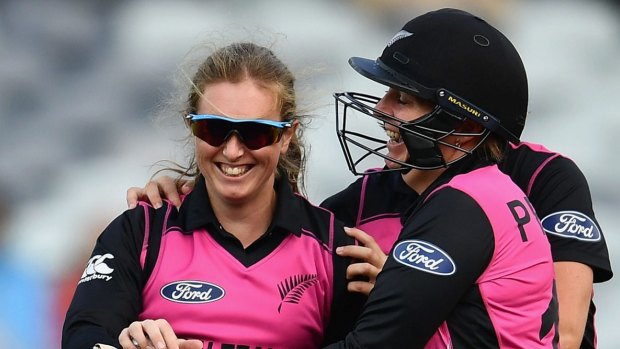 Anna Peterson of New Zealand is congratulated by teammates after taking a hat-trick.