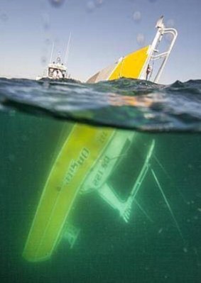 The support vessel slips below the surface during the Rottnest swim.