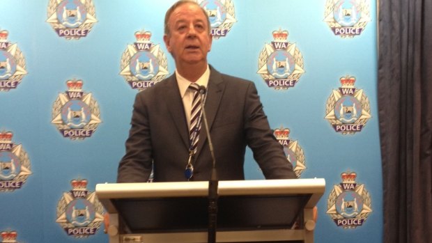 Detective Superintendent Glenn Feeney outlines the charges to reporters.