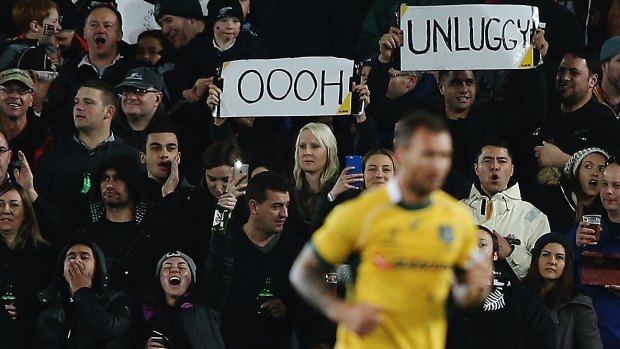 Popular man: All Blacks fans were keen to boo Wallaby Quade Cooper on his way to the sin bin.