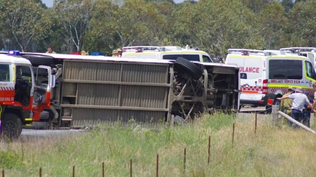 The bus rolled on to its side on Sandy Point Road at Windellama.