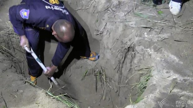 Wayne Schneider's body was found in a two-metre-deep grave in roadside bushes near a Chinese temple.