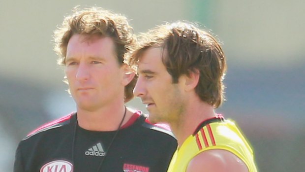 James Hird (left) with Jobe Watson at training earlier this week.