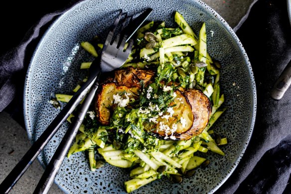 Slow-roasted celeriac steaks with pear salad and quick herb gremolata.