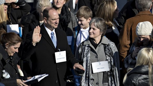 A stand-in for US Vice-President-elect Mike Pence rehearses the oath of office during a rehearsal.