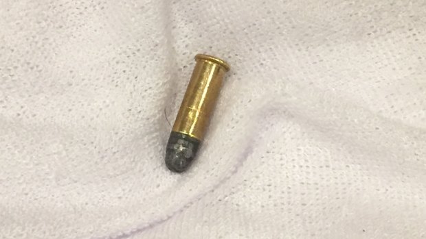 The bullet Mr Chawla said was found in his father's shop. 