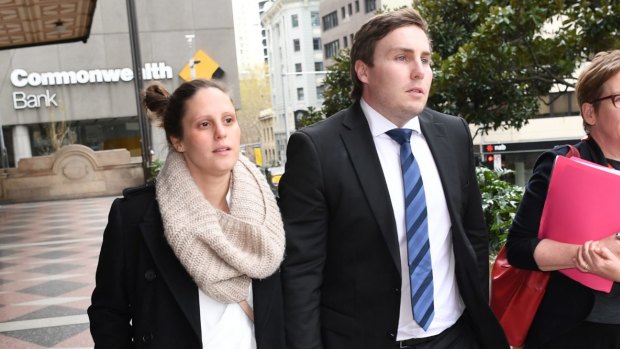 Adam Cranston and his pregnant wife Elizabeth leave the Downing Centre Local Court on Thursday.
