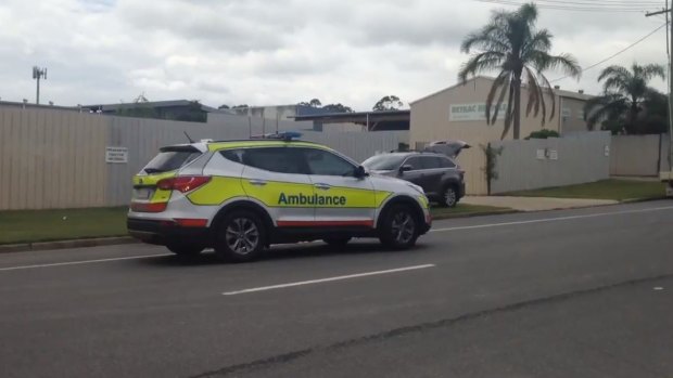 Ambulance officers at the scene of an incident at an industrial estate in Arundel, on the Gold Coast.