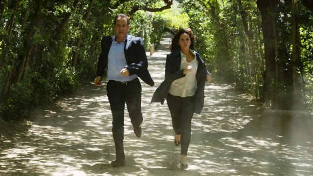 Fast-moving plot: Langdon (Tom Hanks) and Sienna (Felicity Jones) run for their lives through Boboli Gardens, Florence.