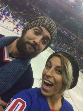 Mr Reid and Ms Kancso at a New York Rangers game; Ms Kancso is trying to raise money for Mr Reid's legal bills.