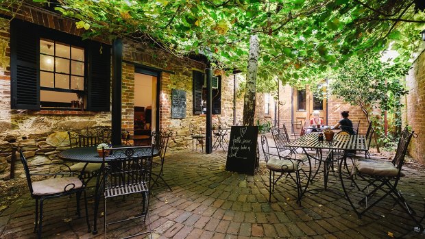 Courtyard dining at Alby + Esthers.