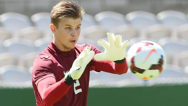 Big time: Mitchell Langerak makes a save during a Socceroos training session.