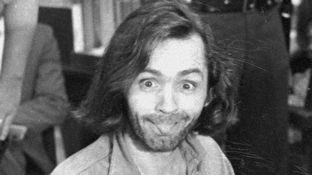 In this June 25, 1970 file photo, Charles Manson sticks his tongue out at photographers as he appears in a Santa Monica, California, courtroom, charged with the slaying of musician Gary Hinman.