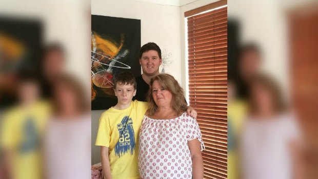 Mandurah mum Sally Finlay is angry at the axing of a specialist program which helped her son Shaun, who is pictured along with older brother James