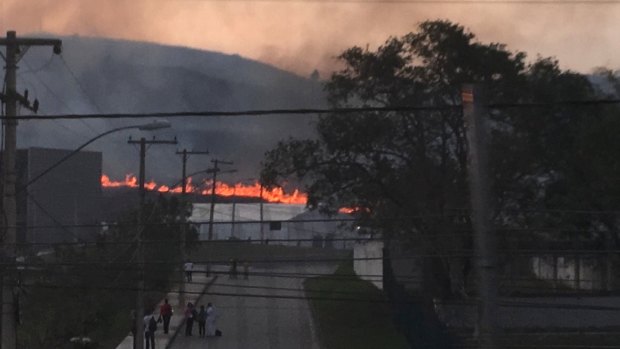 A fire burns near Deodoro.