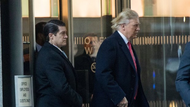 President-elect Donald Trump departs a meeting at the Conde Nast offices on Friday where he reportedly met with Anna Wintour.