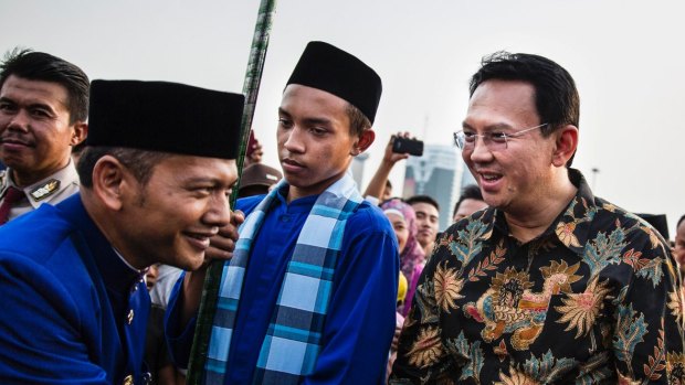 Ahok, right, in 2014. A Christian and ethnic Chinese, he became governor after his predecessor and political ally Joko Widodo was elected president of Indonesia.