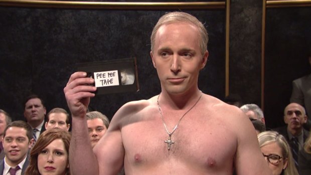 Vladimir Putin with Trump's "pee pee tape".