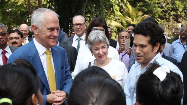 Malcolm Turnbull with Sachin Tendulkar, the cricketer's mother-in-law, Annabel Mehta, and girls from her charity Apnalaya.