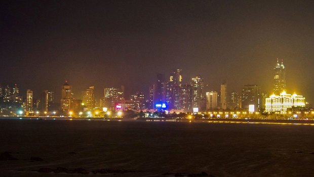 A view of the Mumbai skyline and Back Bay at night from Marine Drive. The tallest buildings in Mumbai, the 254-metre Imperial Towers, on the right.
