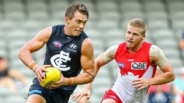 Patrick Cripps of the Blues breaks free.