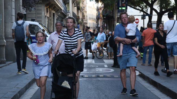 People flee in Barcelona after the terrorist attack.
