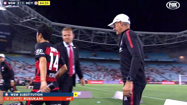 Unhappy: Jumpei Kusukami snubs Josep Gombau's handshake offer during the Wanderers victory over Melbourne City