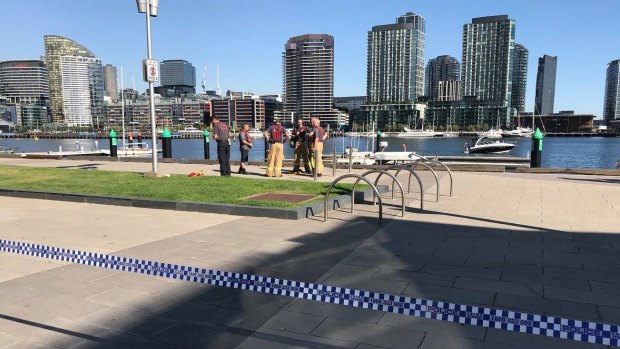 Emergency services at Docklands, where a body was found in the water on Monday afternoon.